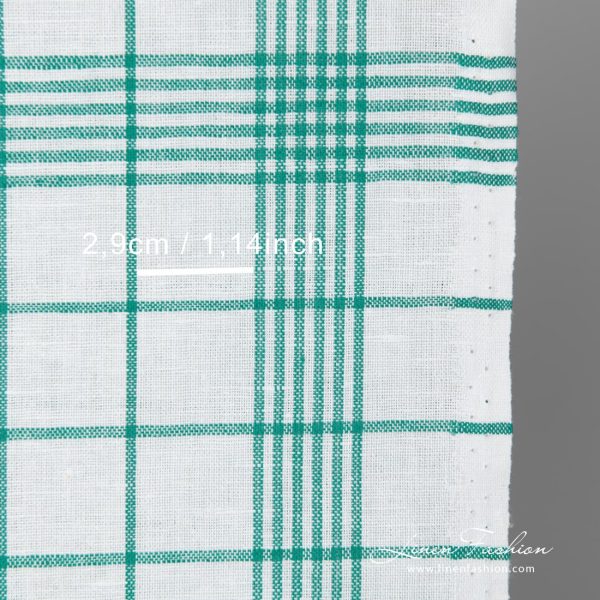 White fabric with green checks narrow width close up view with measurements