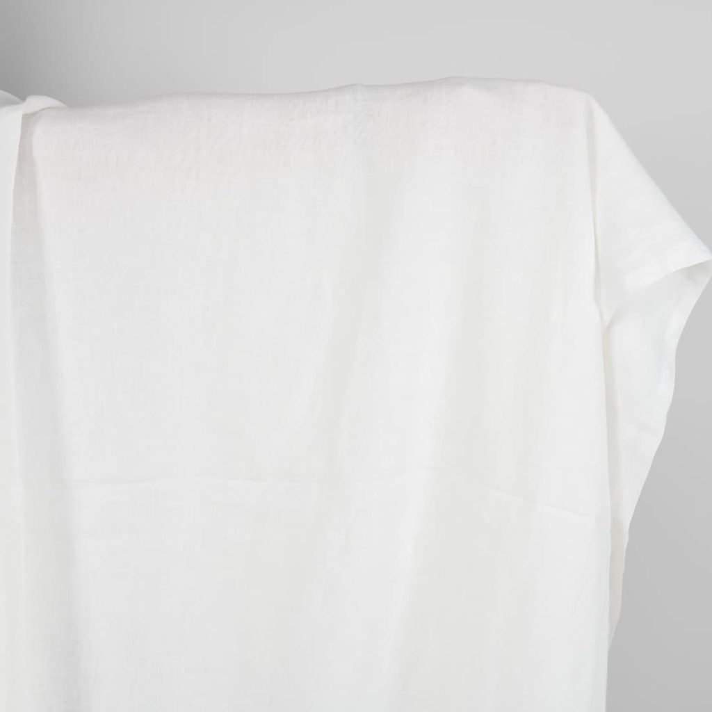 Washed linen fabric in off-white