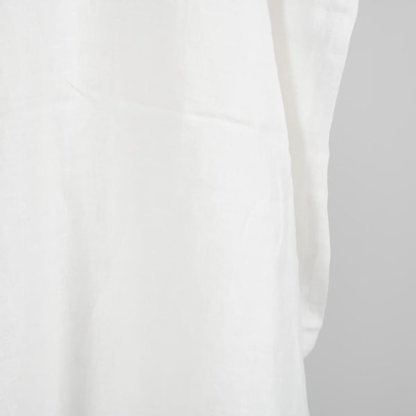 Washed linen fabric in off-white edge