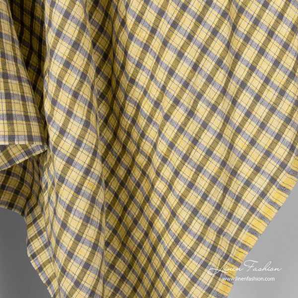 Linen fabric in grey crossing lines and yellow checks