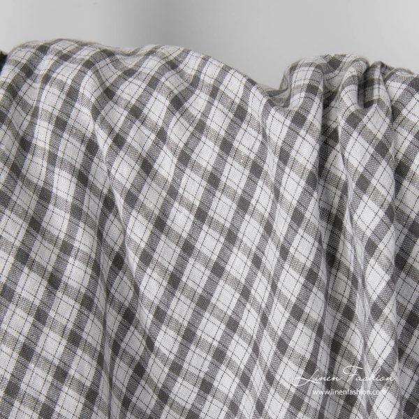 Light grey linen fabric with dark grey checks, washed