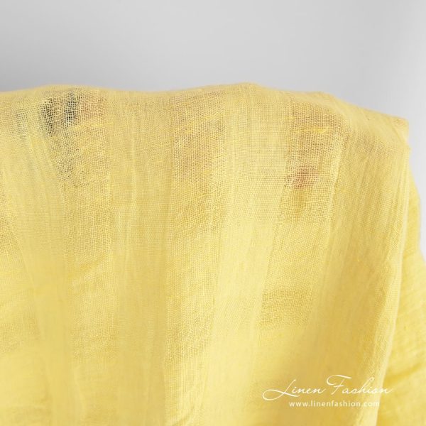 Yellow linen fabric, specially washed to increase softness