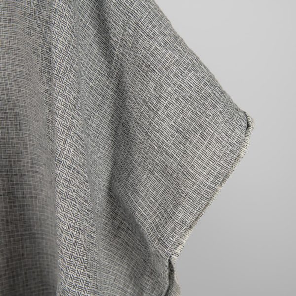 Linen fabric washed dark grey colour close up edge view