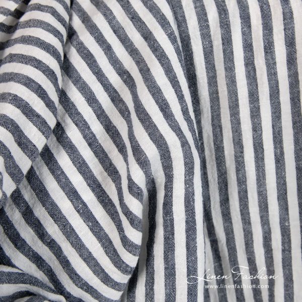 Wide linen fabric in blue stripes, specially washed to increase softness