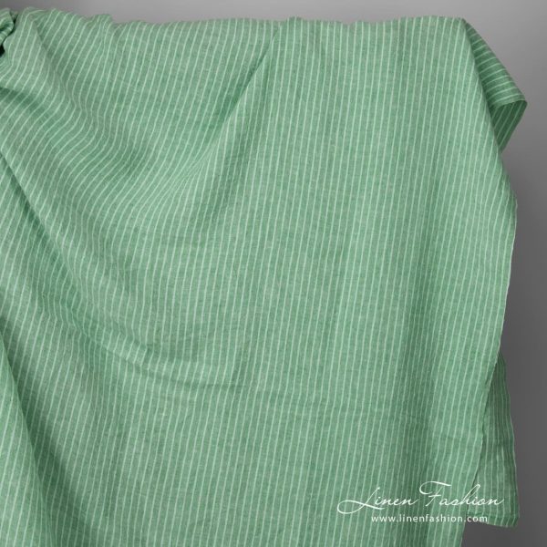 Wide washed green striped linen fabric
