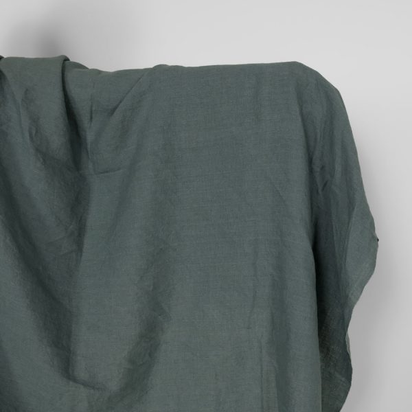 Washed linen fabric in balsam green colour