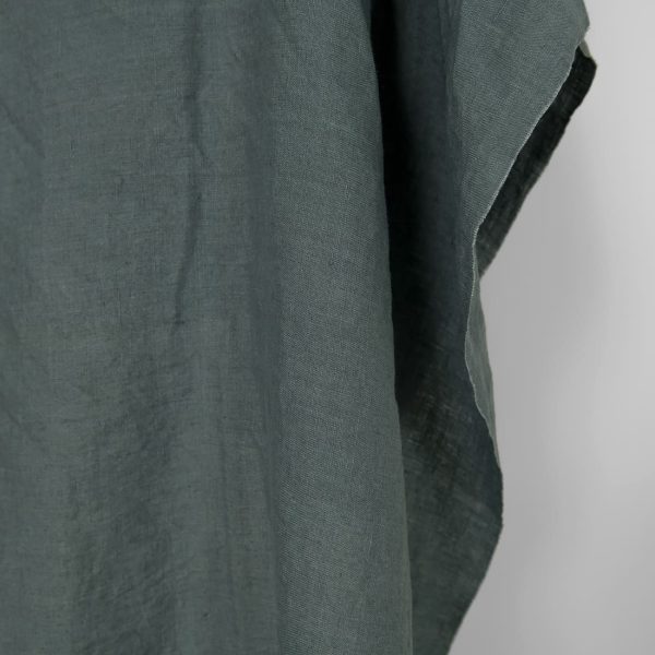 Washed linen fabric in balsam green colour, plain weave