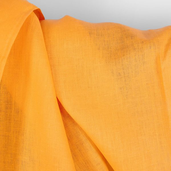 Linen fabric in plain vibrant warm yellow texture