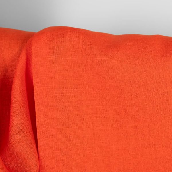 Linen fabric solid orange close up detail
