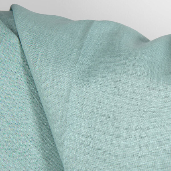 Linen fabric in jadeite colour close up detail
