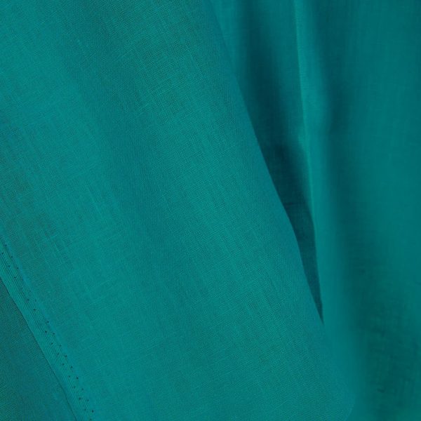 Linen fabric in tile blue colour close up detail