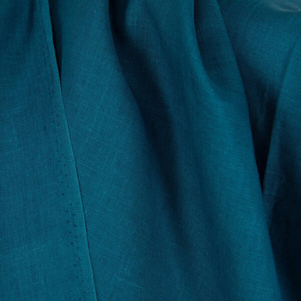 Linen fabric in lyons blue colour close up detail