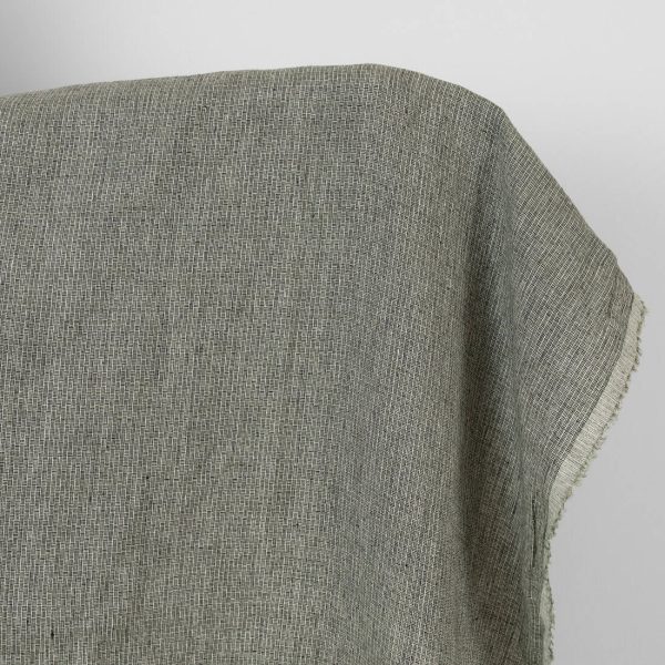 Washed linen fabric green-black small pattern