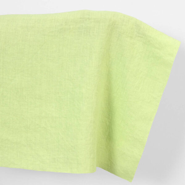 Linen fabric plain pale green, washed