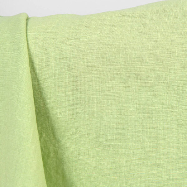 Linen fabric plain pale green, washed, plain weave