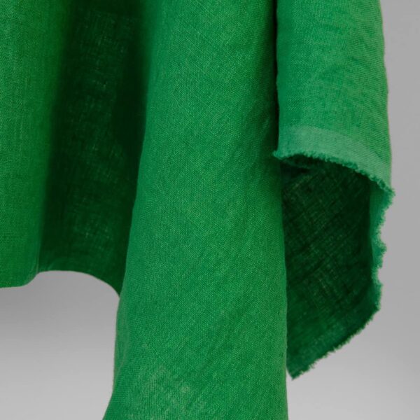 Linen fabric emerald green colour, washed, fabric edge