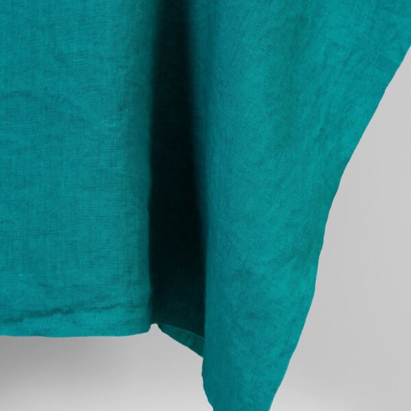 Linen fabric in tile blue, washed