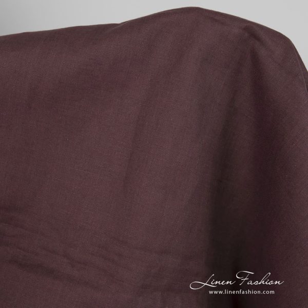 Linen fabric in brown-violet melange close up detail