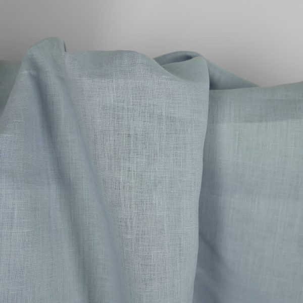 Linen fabric light bluish green close up detail