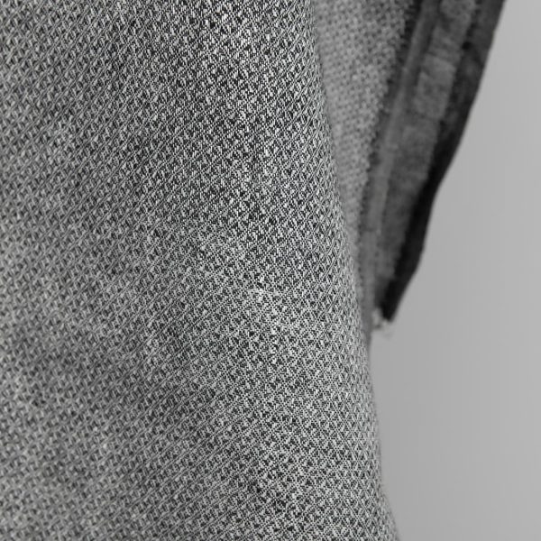Linen fabric in diamond pattern black and white close up detail