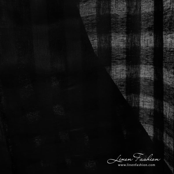 Black dyed linen fabric with checks.