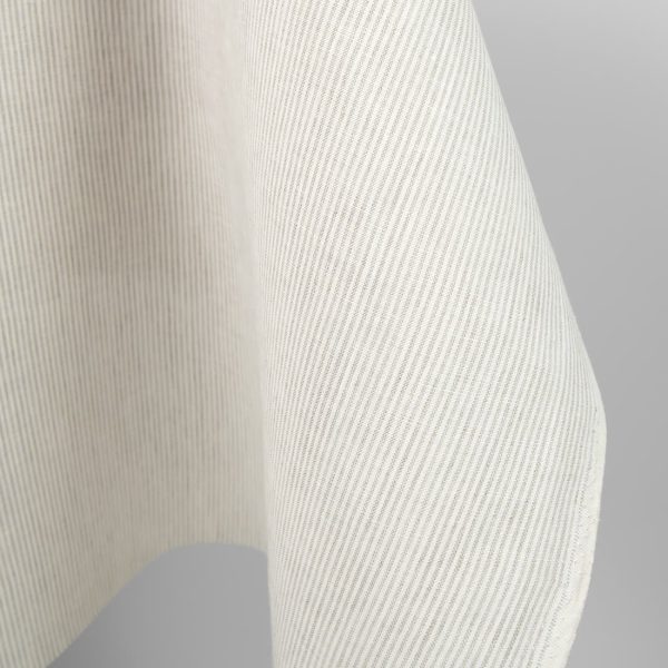 Linen fabric in natural and white colour stripes close up edge photo
