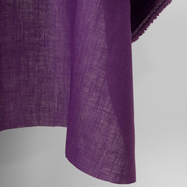 Linen fabric violet colour close up edge view