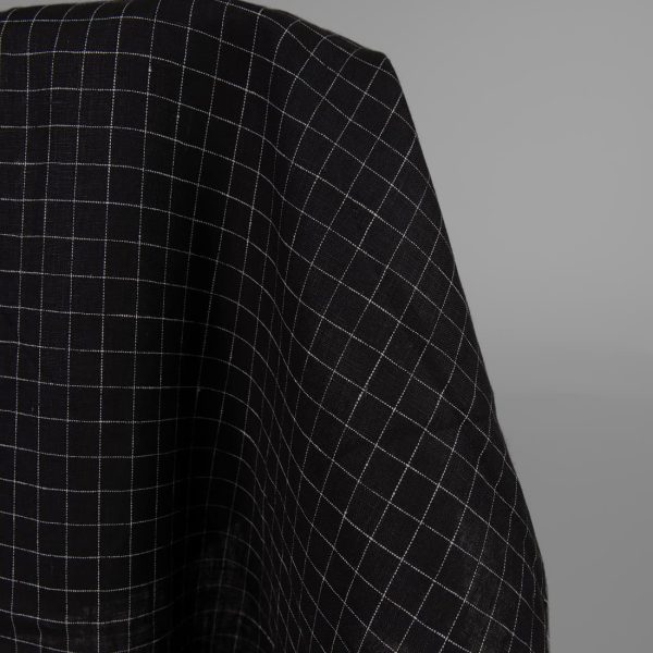 Black linen fabric white checks close up detail