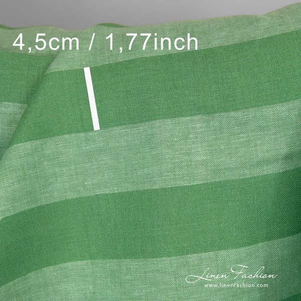 Green dyed linen fabric with stripes.
