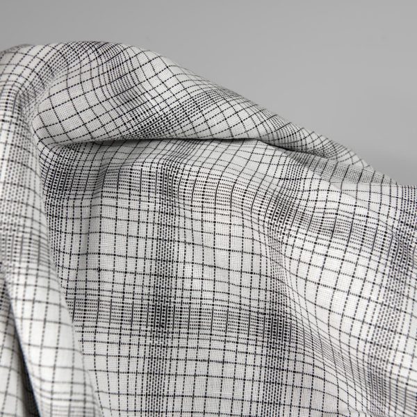 Linen cotton fabric white with black checks close up product view
