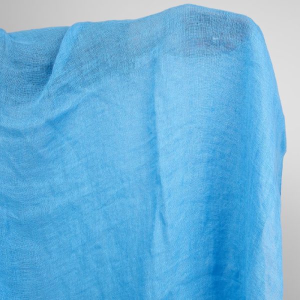 linen gauze bright blue fabric, washed