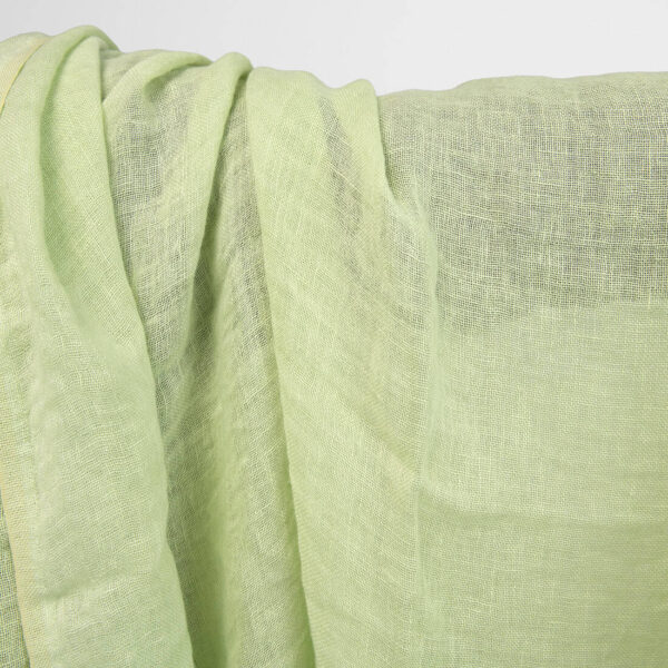 Washed linen gauze fabric plain pale green, 145cm.