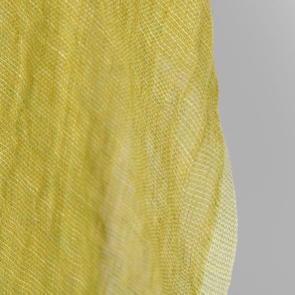 Washed linen fabric yellow green transparent, fabric edge