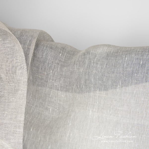 Transparent, lightweight light grey 100% linen fabric woven in a gauze pattern from natural flax grey and optical white yarns