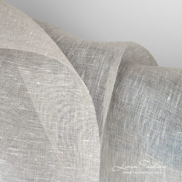 Transparent linen fabric in light grey can be used to make curtains, shawls and other sheer and lightweight textile.