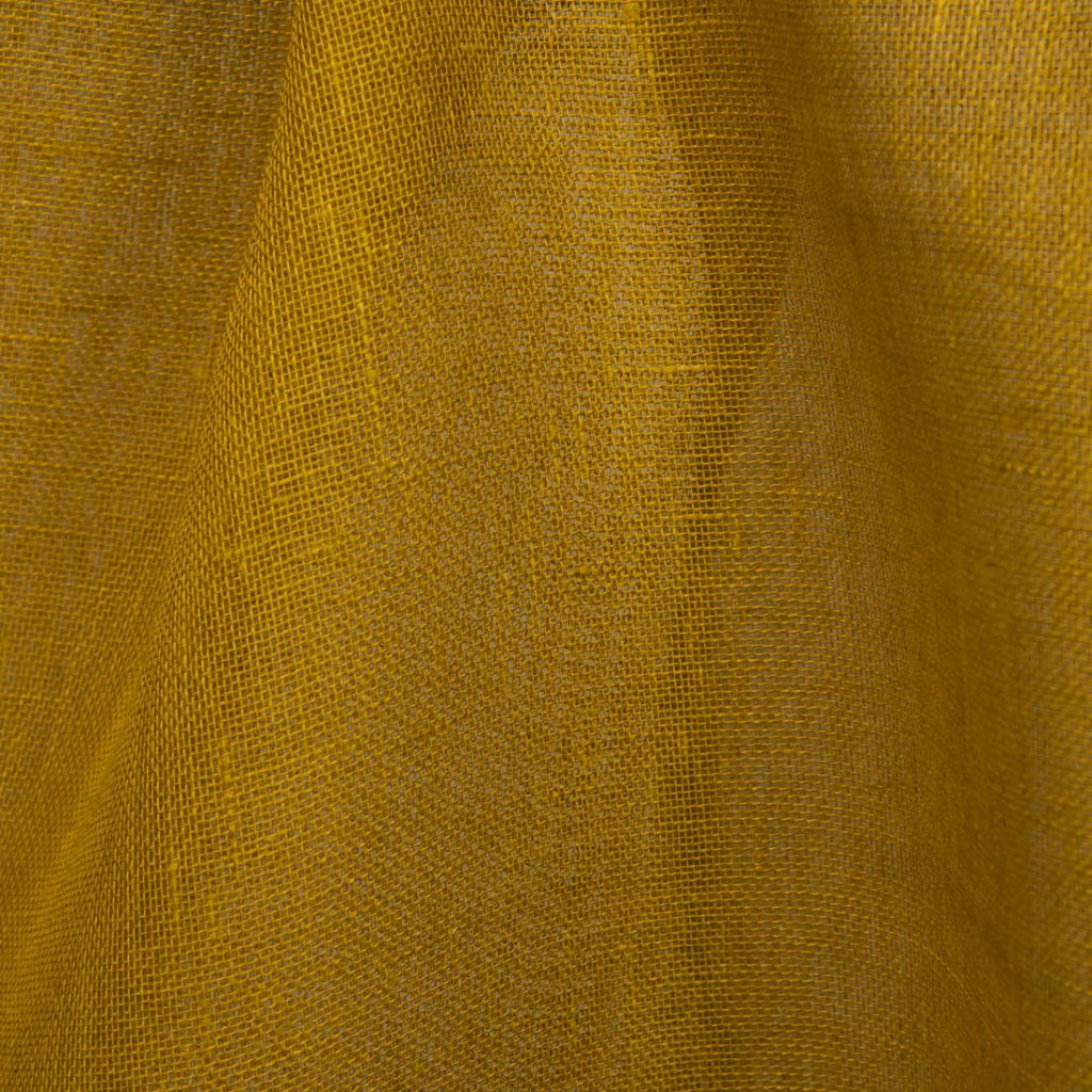 Pure linen fabric gauze in deep yellow color.