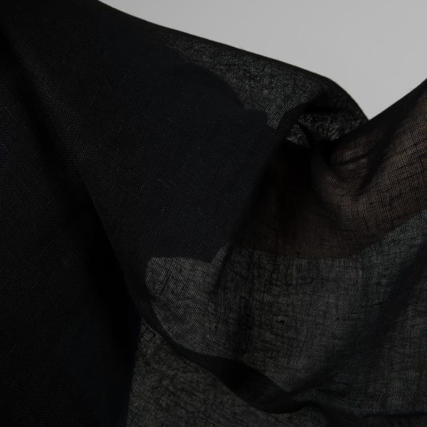 Transparent linen black fabric close up detail