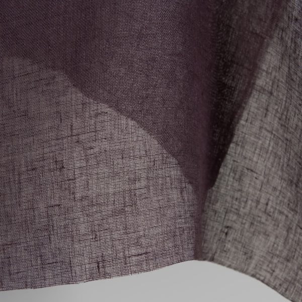 Transparent linen fabric in dark violet colour close up detail