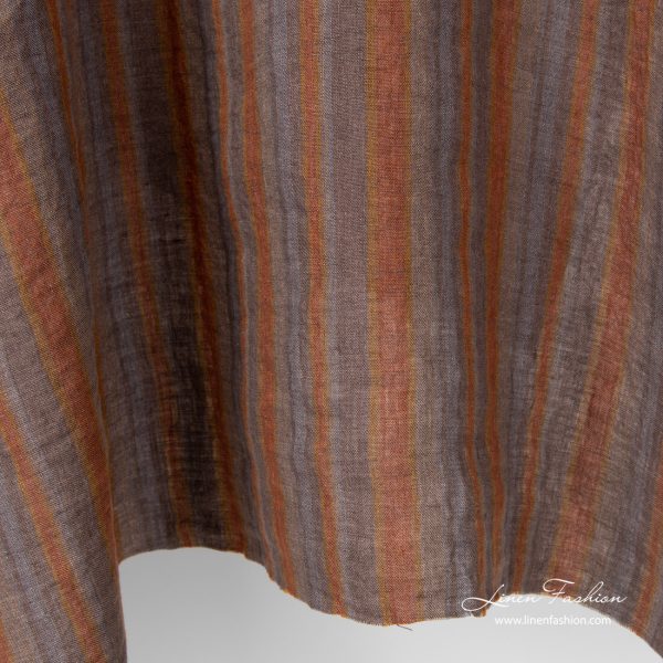 Variable brown and grey stripe width linen fabric, washed