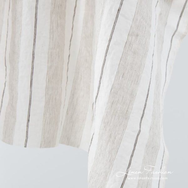 Washed 100% linen fabric in white colour.