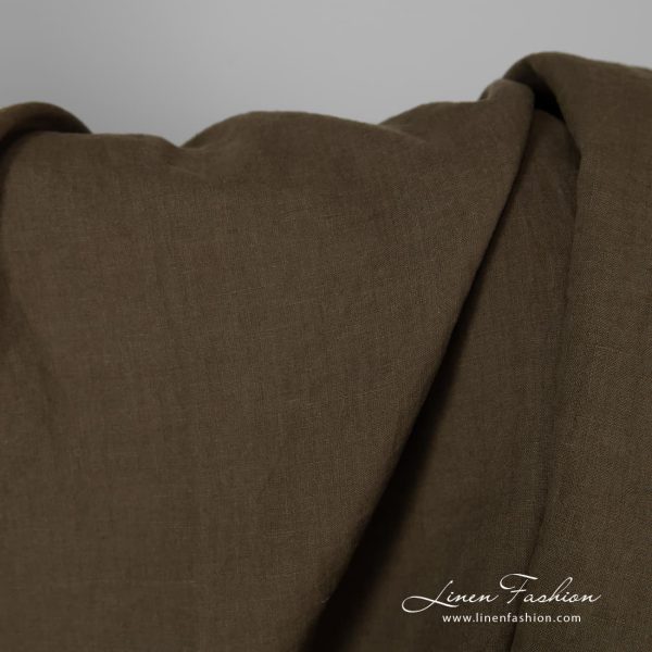 Washed linen fabric in ivy green colour.