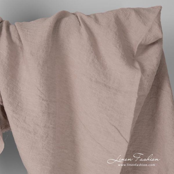 Wide linen fabric in smokey rose colour, washed