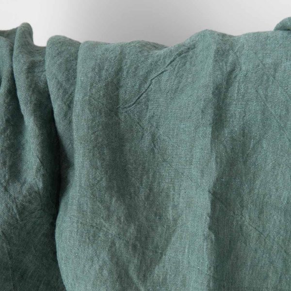Washed green melange linen fabric
