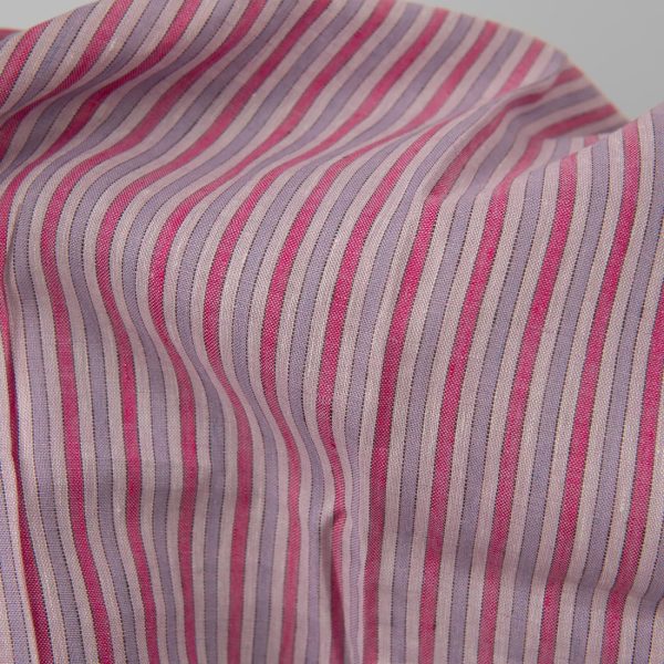 Linen fabric with pink stripes close up detail