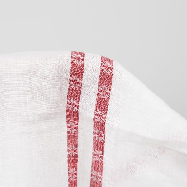 White linen fabric with red lines close up detail
