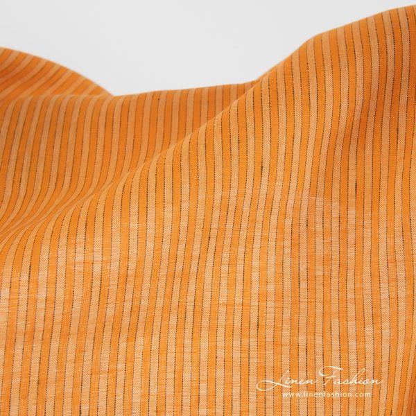Linen fabric in orange colour.