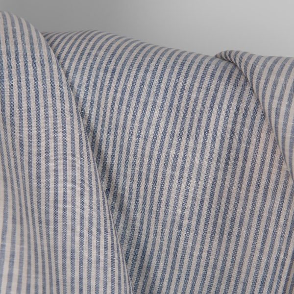 Linen fabric in blue and brownish colour stripes close up detail