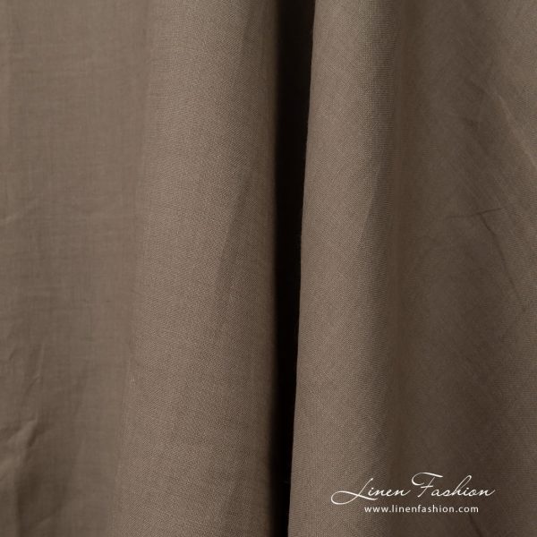 Wide linen fabric greyish brown colour close up detail