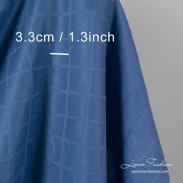 Blue jacquard linen cotton blend fabric woven in diagonal lines