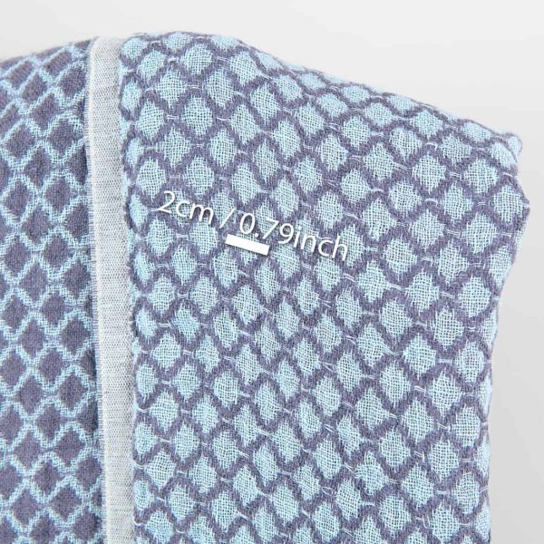 Blue double-sided washed linen fabric in a diamond pattern, with measurements
